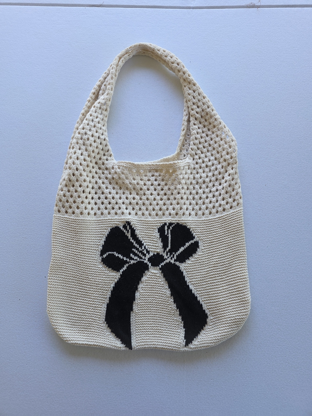 Cream Knit Shoulder Bag with Black Bow Motif